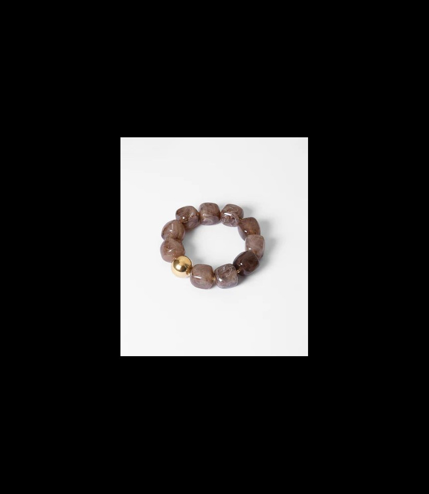 ZAG BIJOUX Bracelet Oedipe élastique en acier doré à l'or fin par ionisation parsemé de perles de résine de couleur taupe e